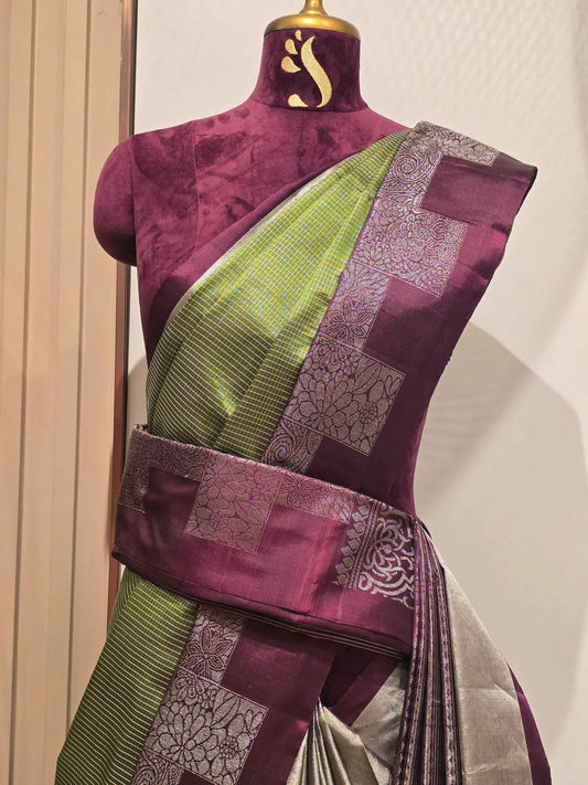 South Indian Kanchipuram silk saree styled with a distinctive modern grid-patterned layout border