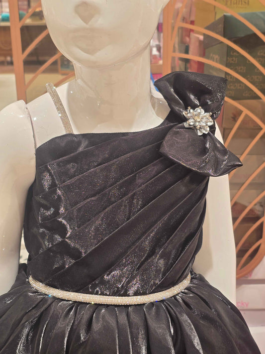 Satin material black coloured party wear frock with speghetti on right side and bow on left