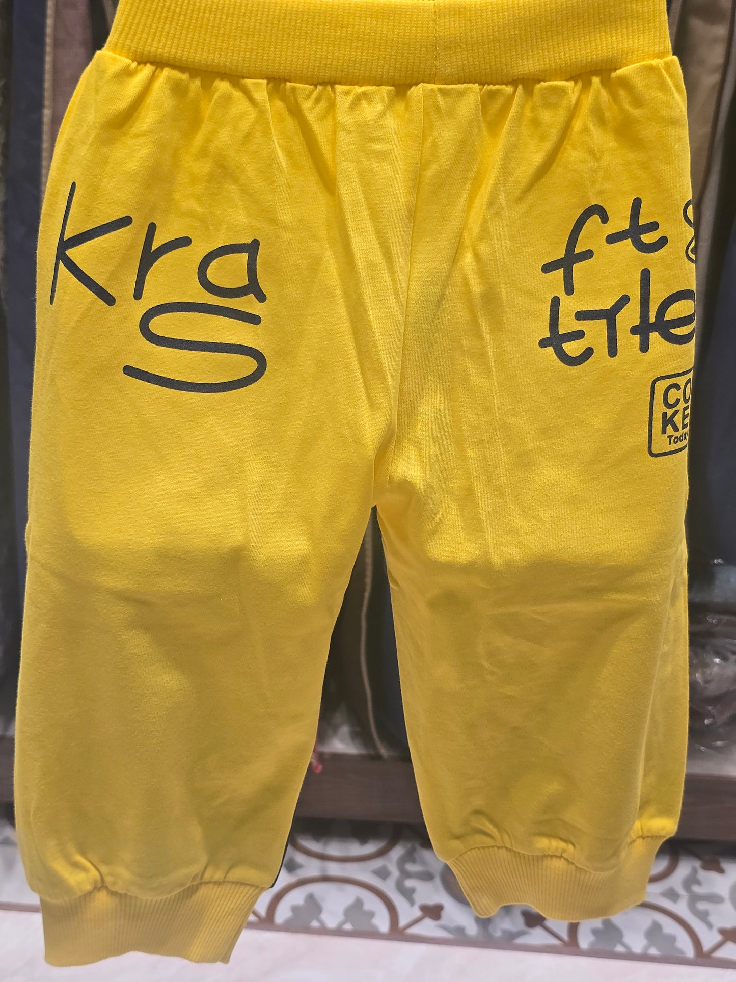 Yellow Cotton Shorts for Boys with Blue Rubber Print Design and Round Elastic Waistband for Summer Wear