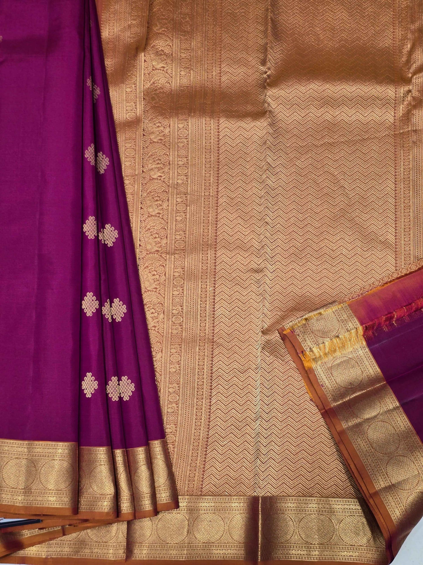 Pure Kanjivaram silk Magenta color saree with kolam butta