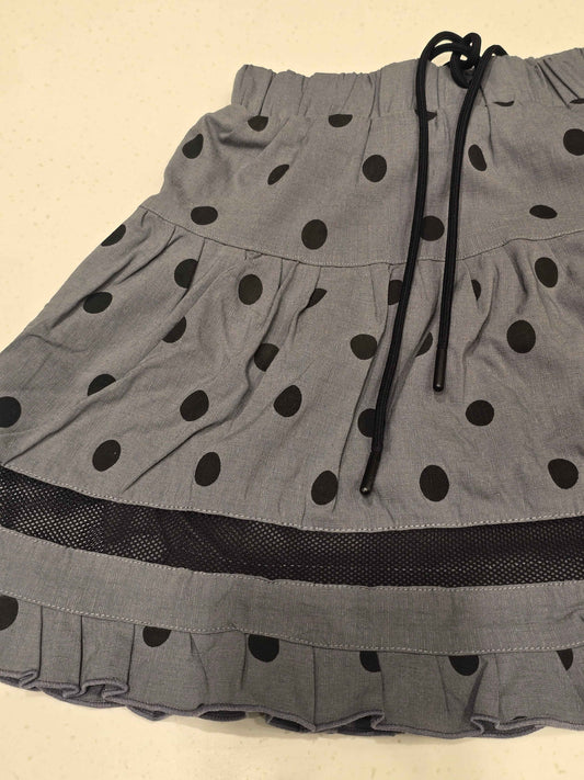 grey tiered mini skirt with black polka dots