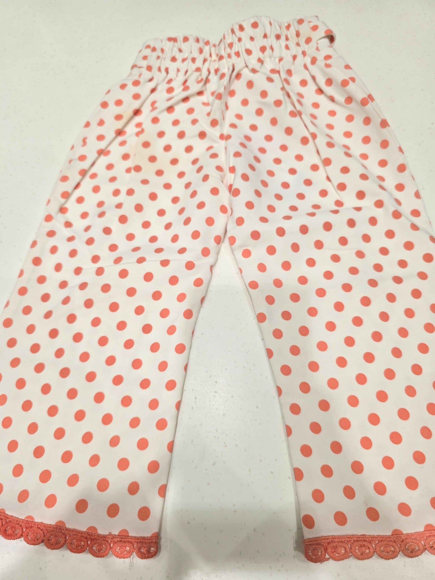 Cotton material white based with peach polka dots