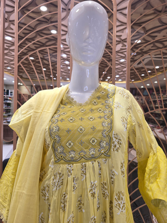 Lemon Yellow Cotton Anarkali Kurti Set for Women with Leaf Style All-Over Print and Embroidered V-Neck Detailing