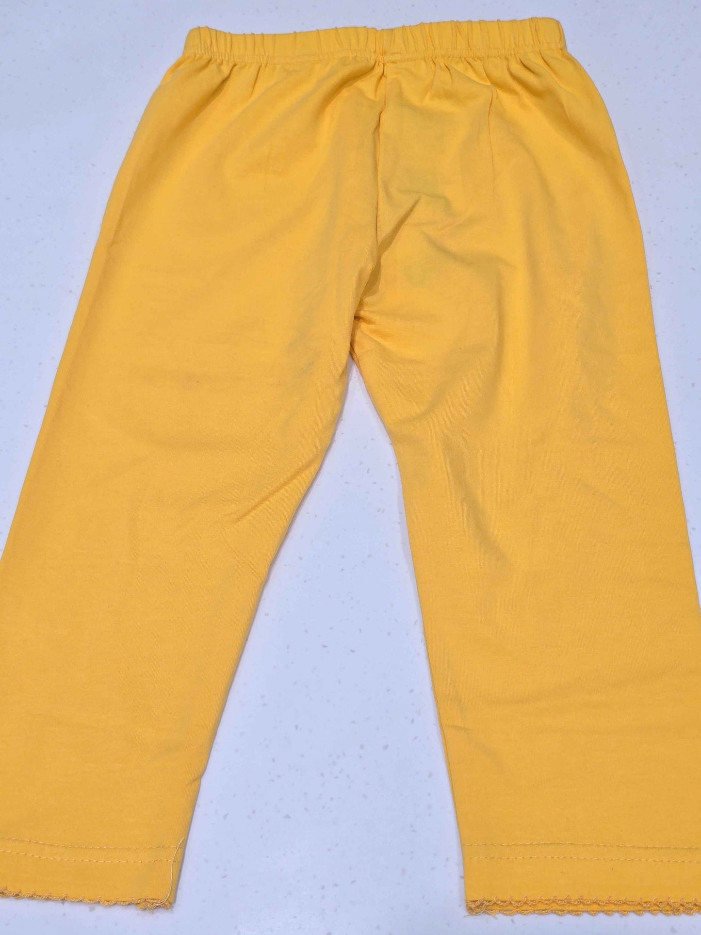 Cotton material yellow colour capri for girl