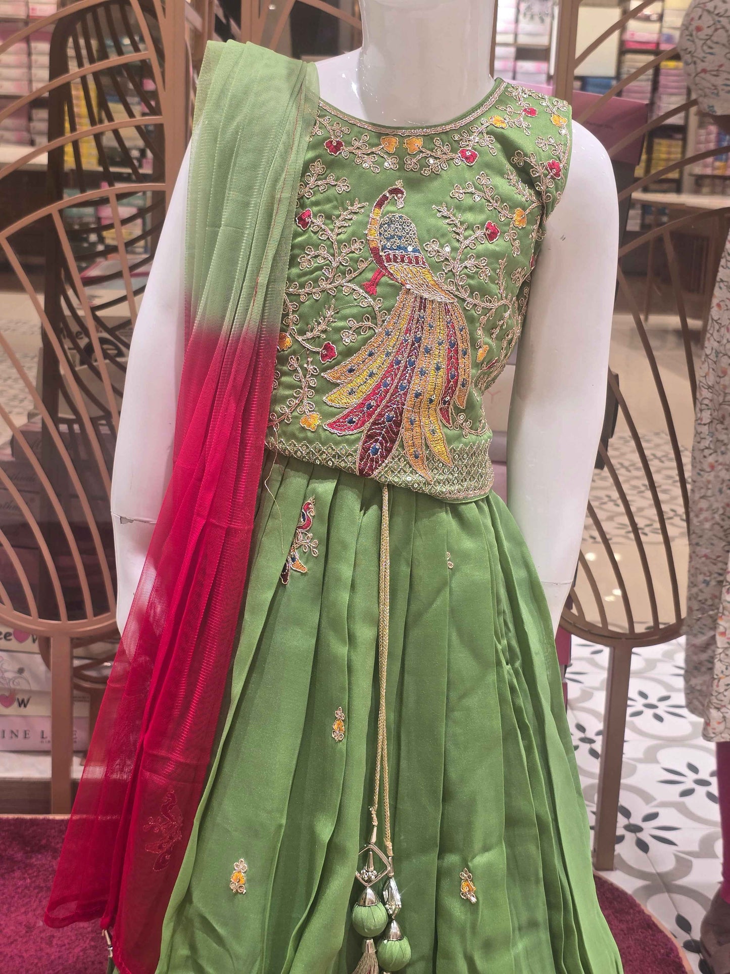 Crape material Parrot green colour gaghra set with peacock design and multi colour zari embroidery
