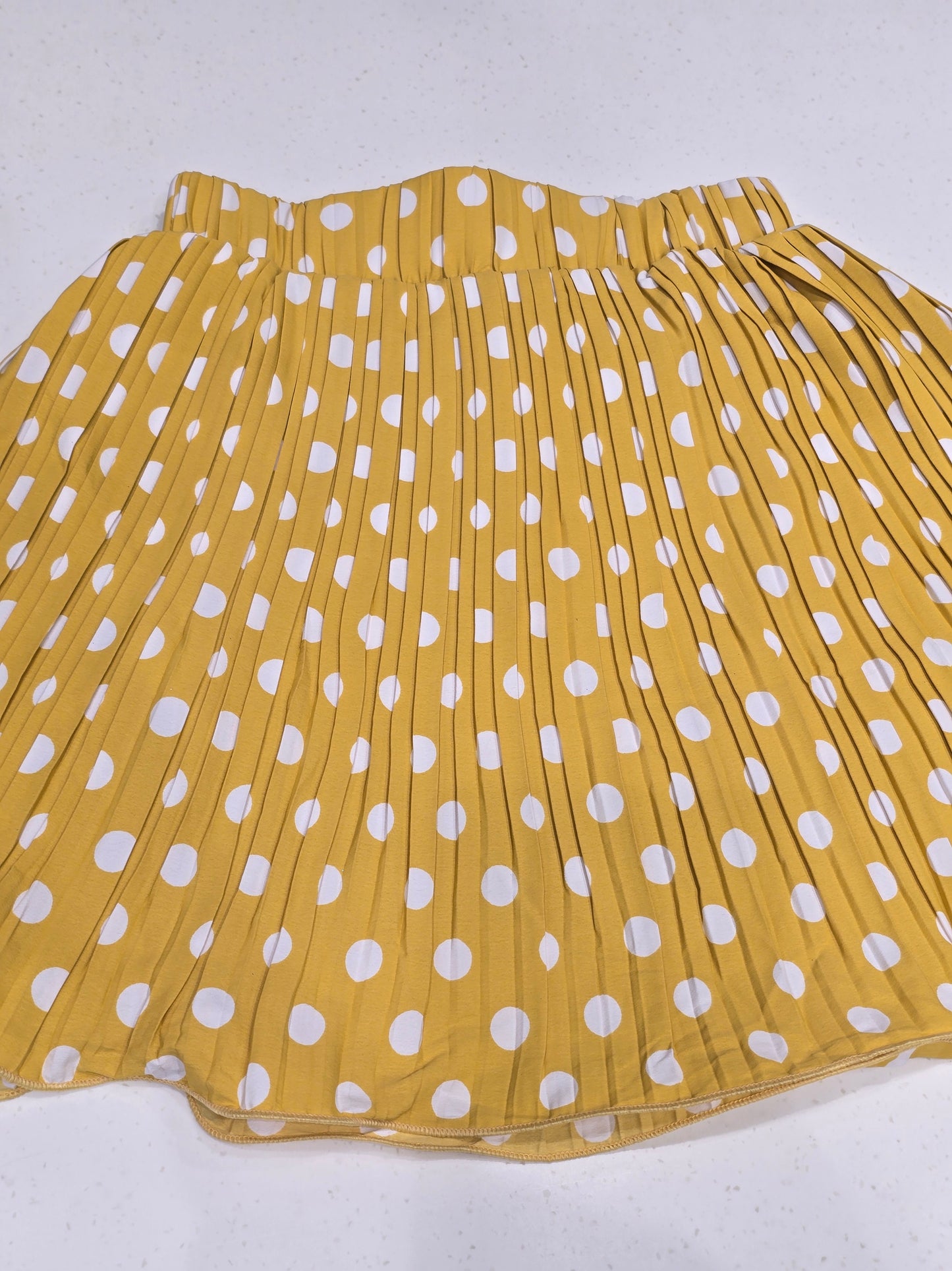 mustard yellow and white polka dot pleated skirt
