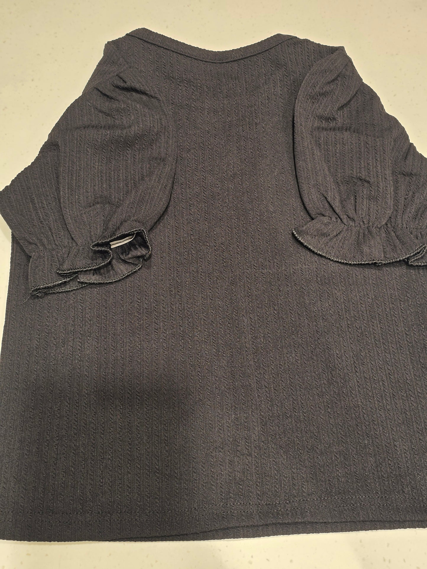 black kids' ribbed knit top,