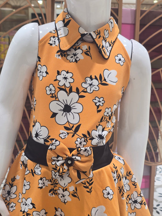 Girls Orange Printed Crepe Short Frock with Bow Waist and I-Neck