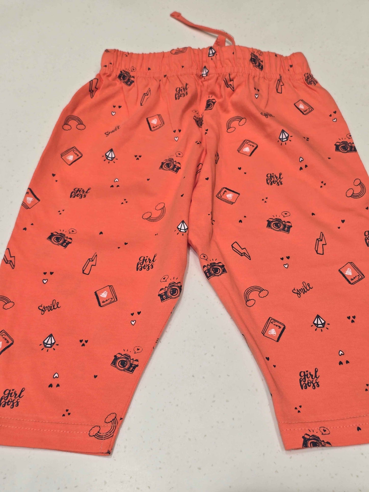 Printed Cotton material orange color capri for girls