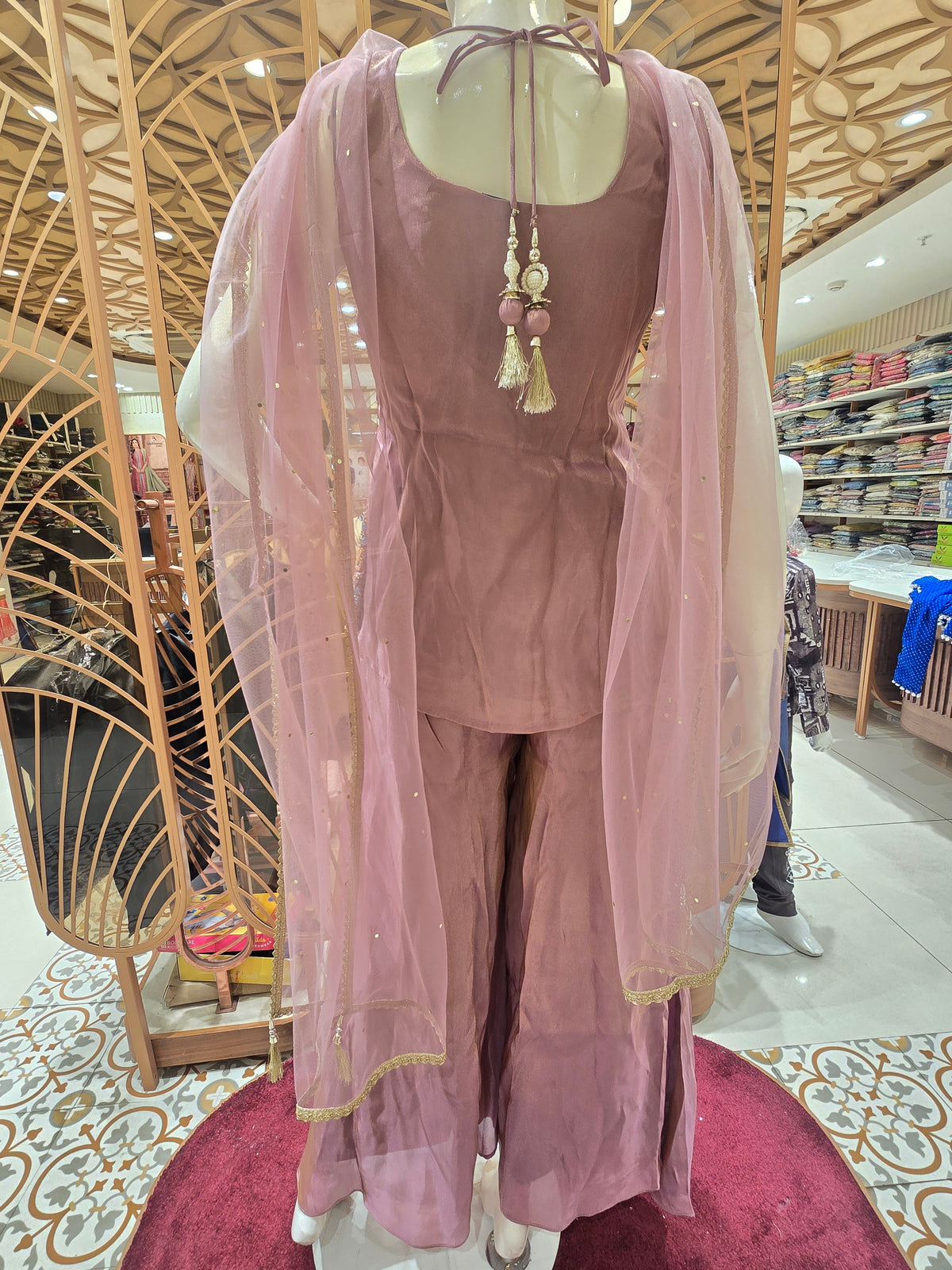 mauve peplum sharara suit.