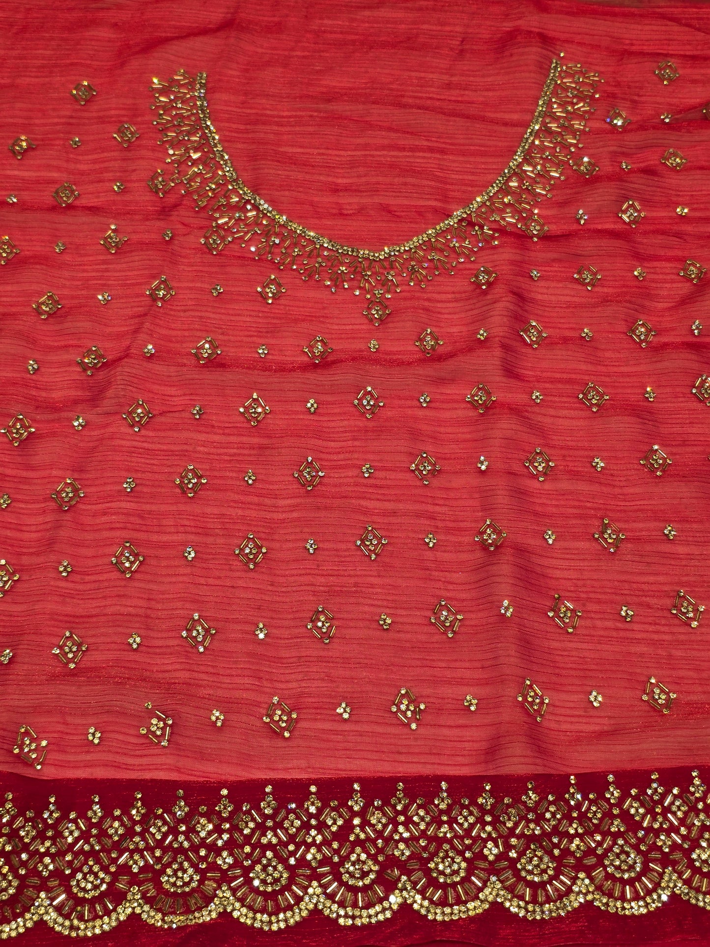 Stone work with leharia design and rich blouse