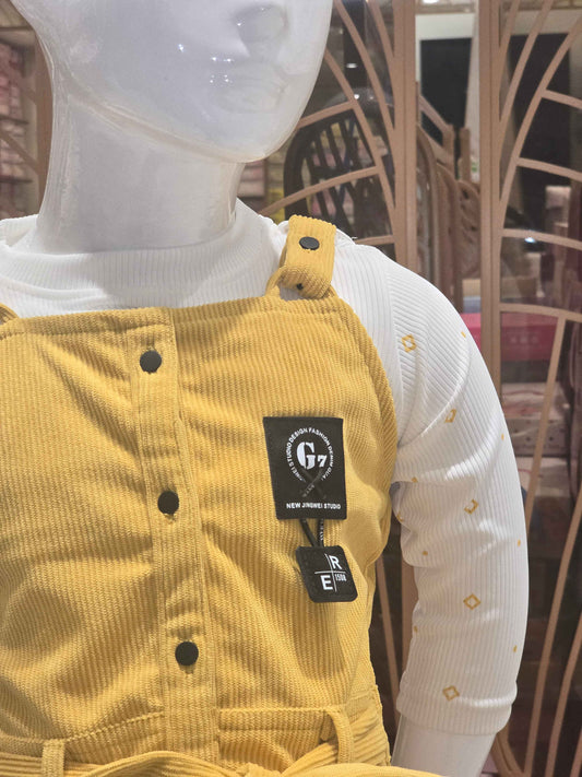 Corduroy material mustred with white colour dangri frock with tieing and 2 pockets