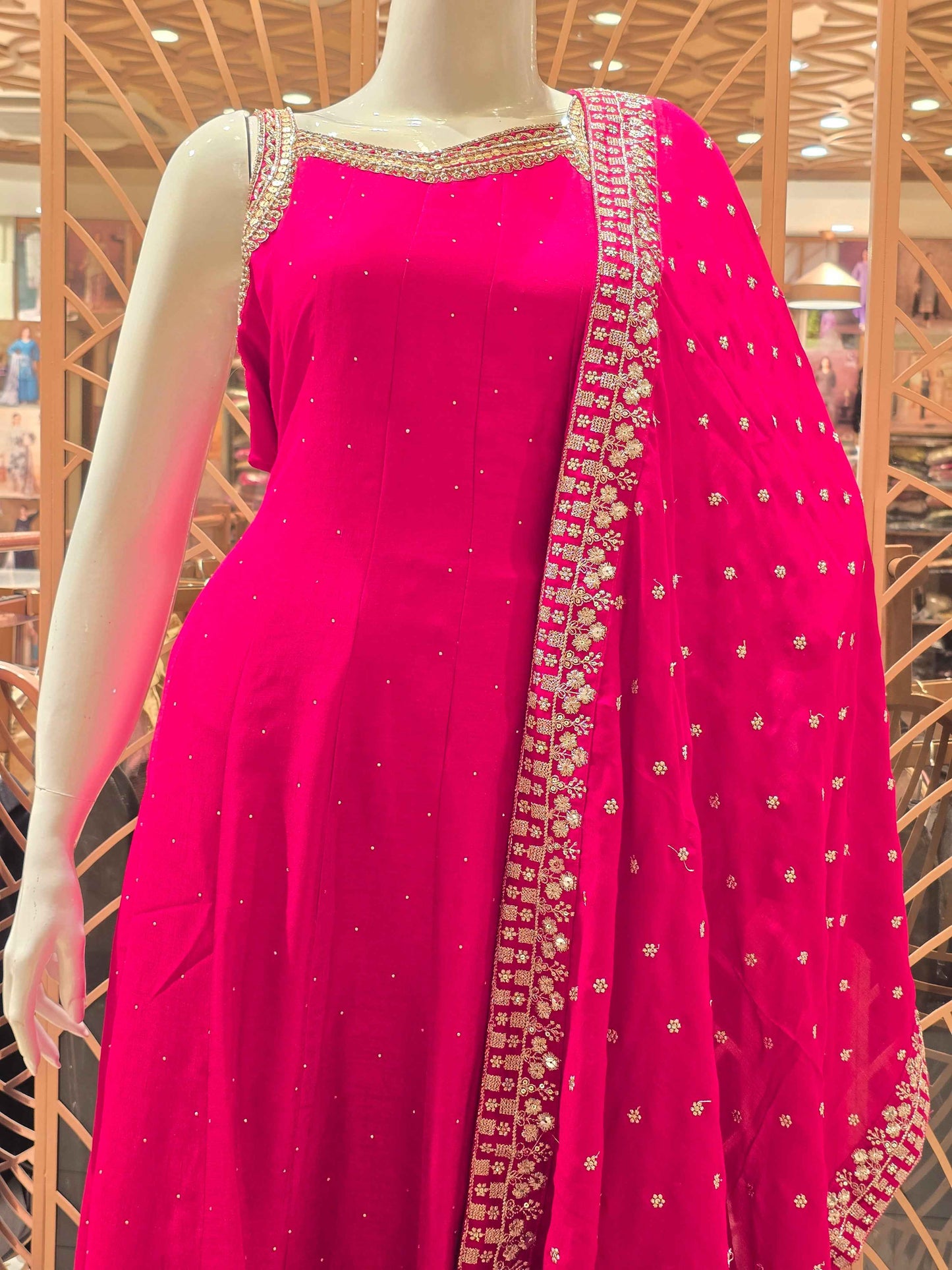 Semi silk material Rani pink colour anarkali set with speghetti neck