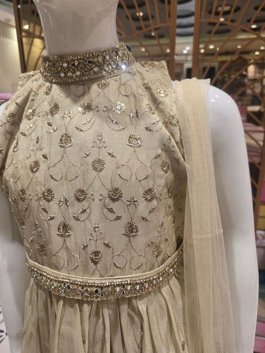 Cream Colored Tissue Silk Sharara Palazzo Set for Girls with Mirror & Stone Work, Zari Embroidery I-Neck and Side-Cut Net Dupatta – 3 Piece Ethnic Set