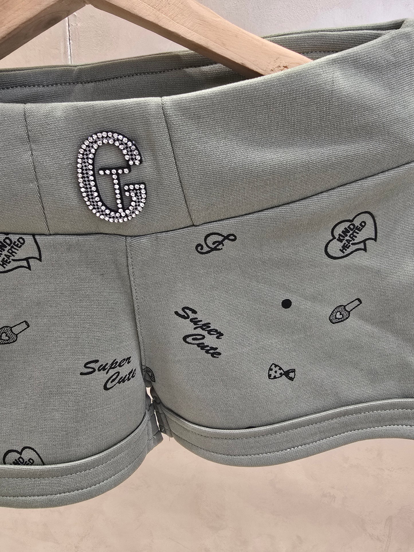 Girls Lycra Casual Wear Shorts in Grey with Small Printed Design, Stylish Logo and Elastic Waist for Summer Wear