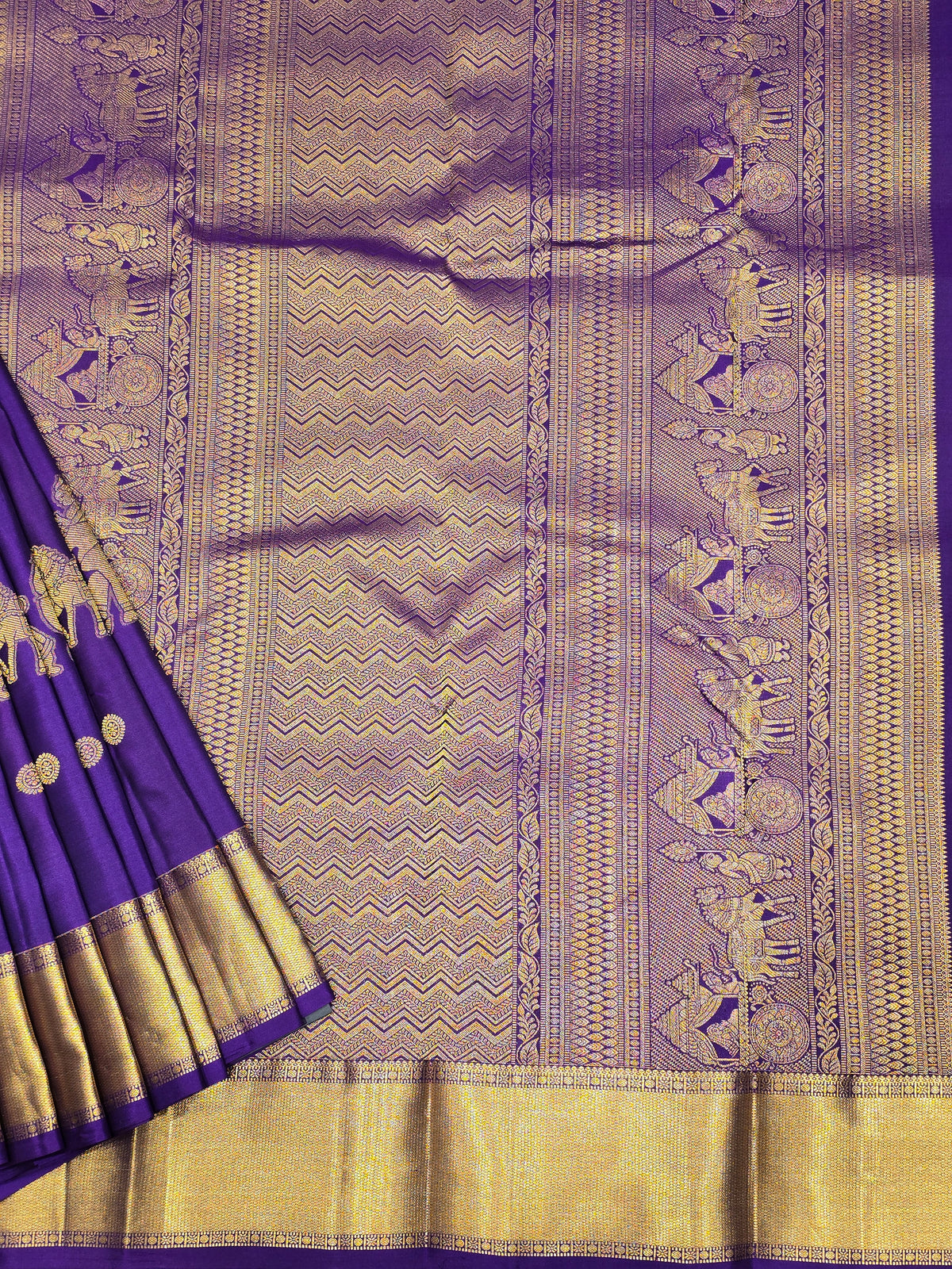 One saree is a deep royal purple, and the other is a rich magenta/wine tone.