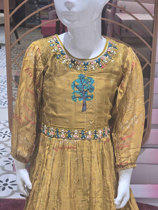 Crepe sequence material mustred color ethnic wear gown with mirror work on neck and waist