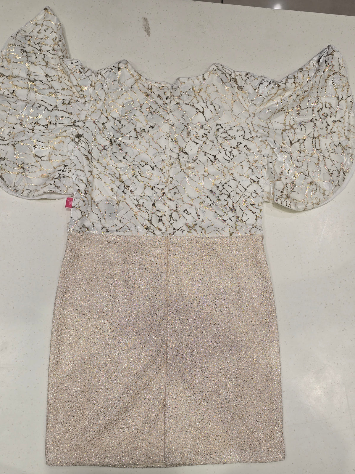 girls' party dress designed with a distinct two-toned look.