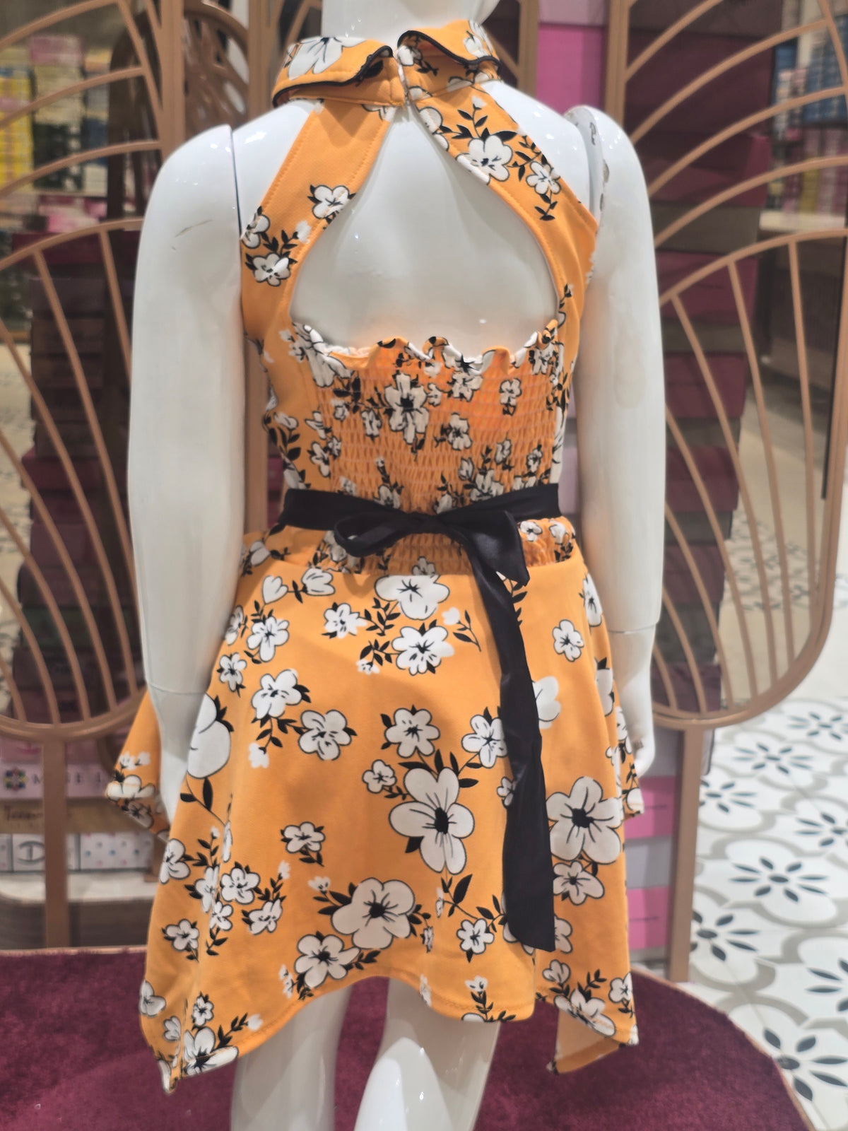 Girls Orange Printed Crepe Short Frock with Bow Waist and I-Neck