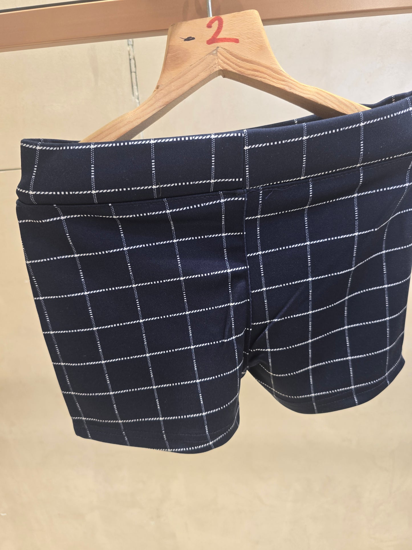 Girls Lycra Casual Wear Shorts in Dark Blue with Checked Pattern, Key Chain Detail and Elastic Waist for Summer Wear