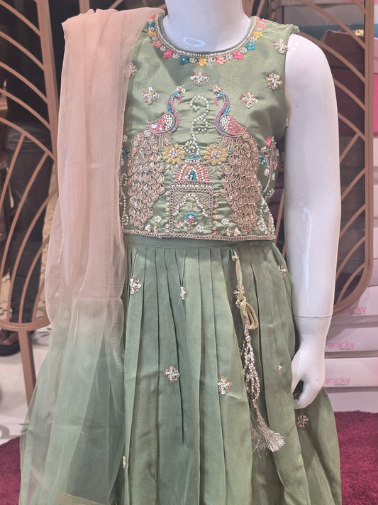 Pista Green Tissue Ethnic Wear Ghagra for Girls with Peacock Motif Work, Decorated Skirt Border and Dual Colored Dupatta