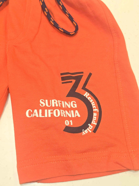 Pure cotton material orange coloured ¾ with prints and round Elasticable