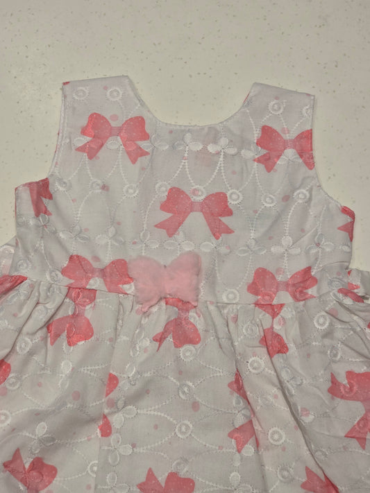 Printed Cotton material white based peach colour bow design frock