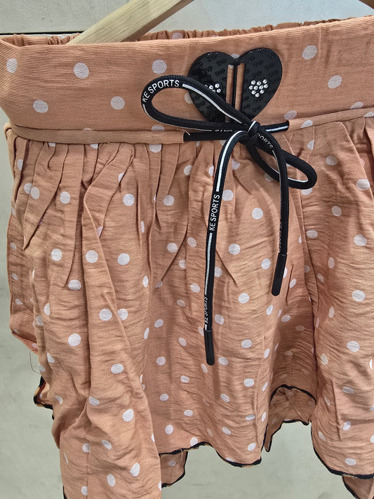 Girls Cotton Casual Wear Skirt in Peach with Polka Dot Design, Elastic Waist and Tie Detail for Summer Wear