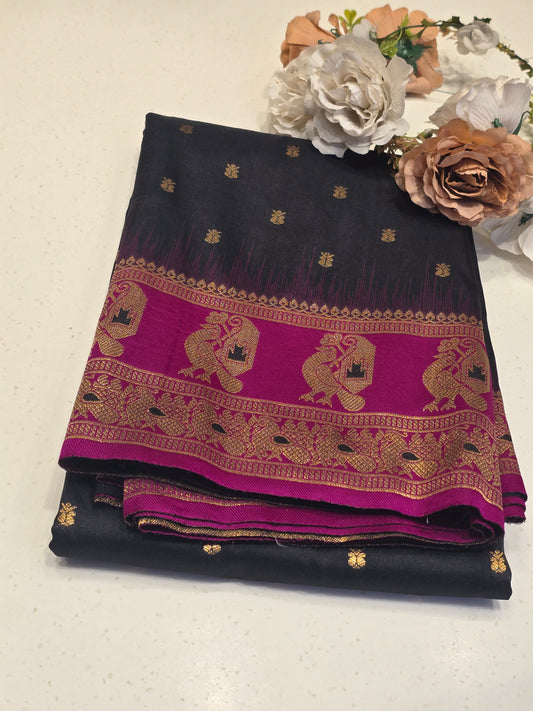 Semi soft silk with butta across the body rich pallu , traditional border