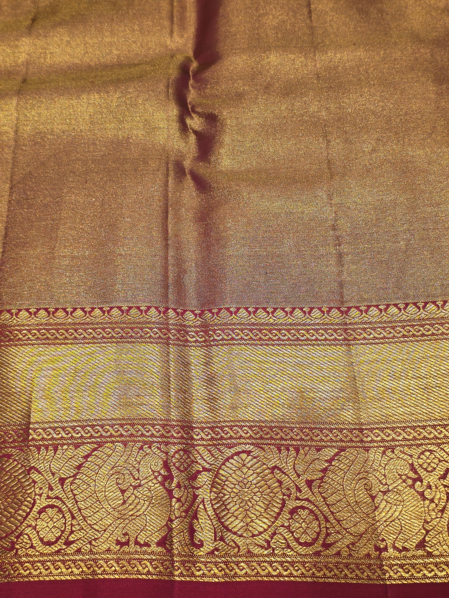 Handloom pure kanchee tissue silk with leaf motif and traditional border , rich pallu wedding wear