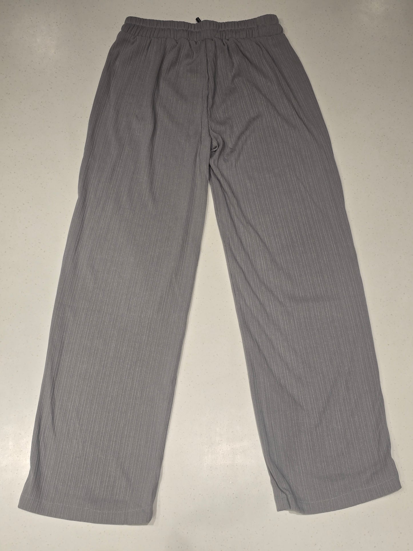 grey plisse textured trousers