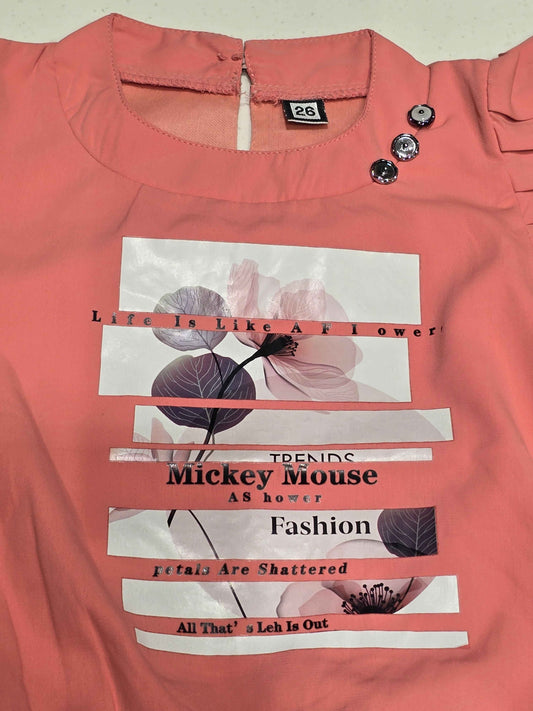 pink or peach-colored western-wear top for young girls