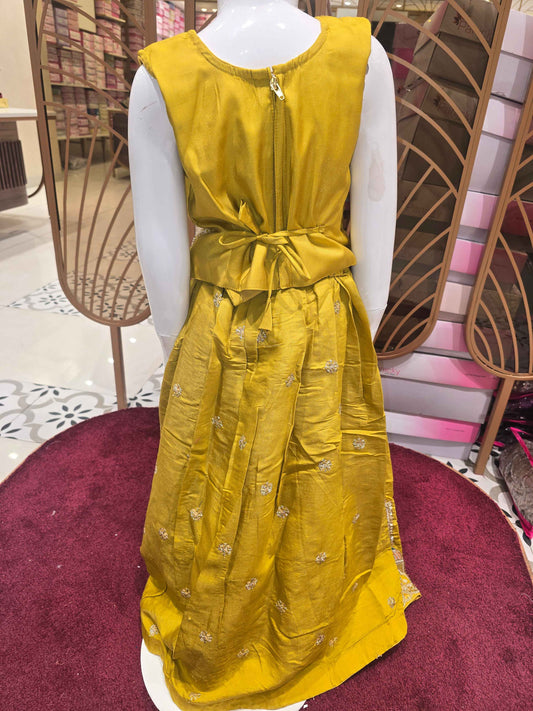 Chinon material yellow colour ethnic wear. beats & sequence work on peacock designed top and thread work on round neck, with ladkans