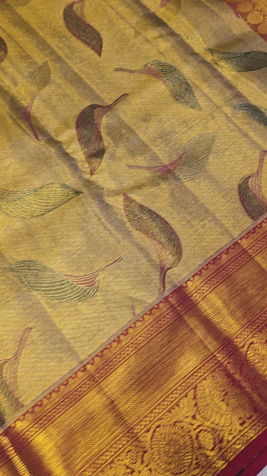 Handloom pure kanchee tissue silk with leaf motif and traditional border , rich pallu wedding wear