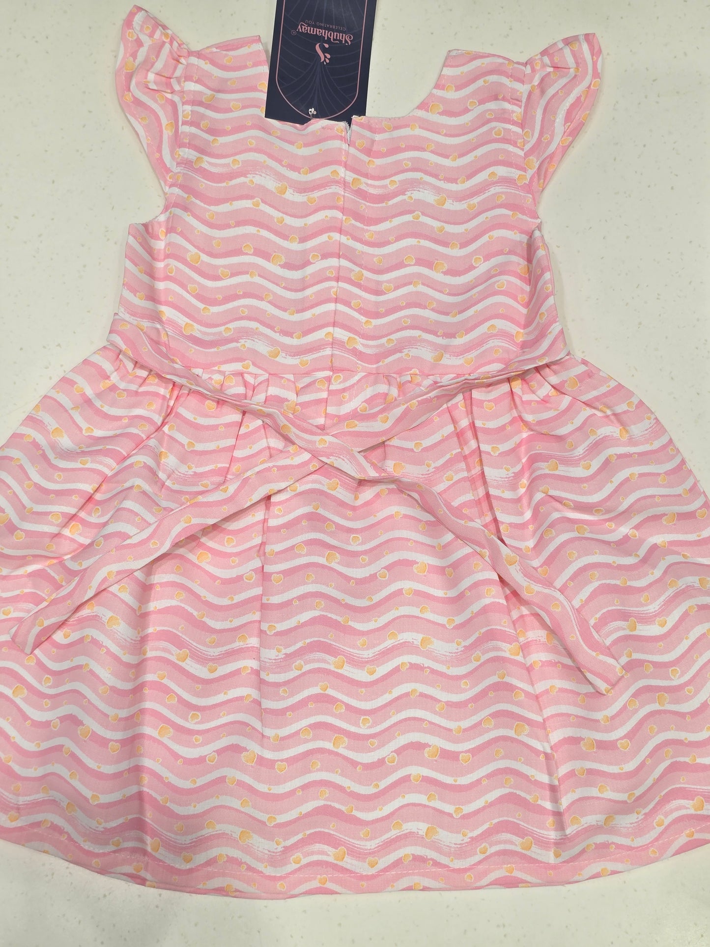 Cotton material babypink with white color frock with mega Sleeves