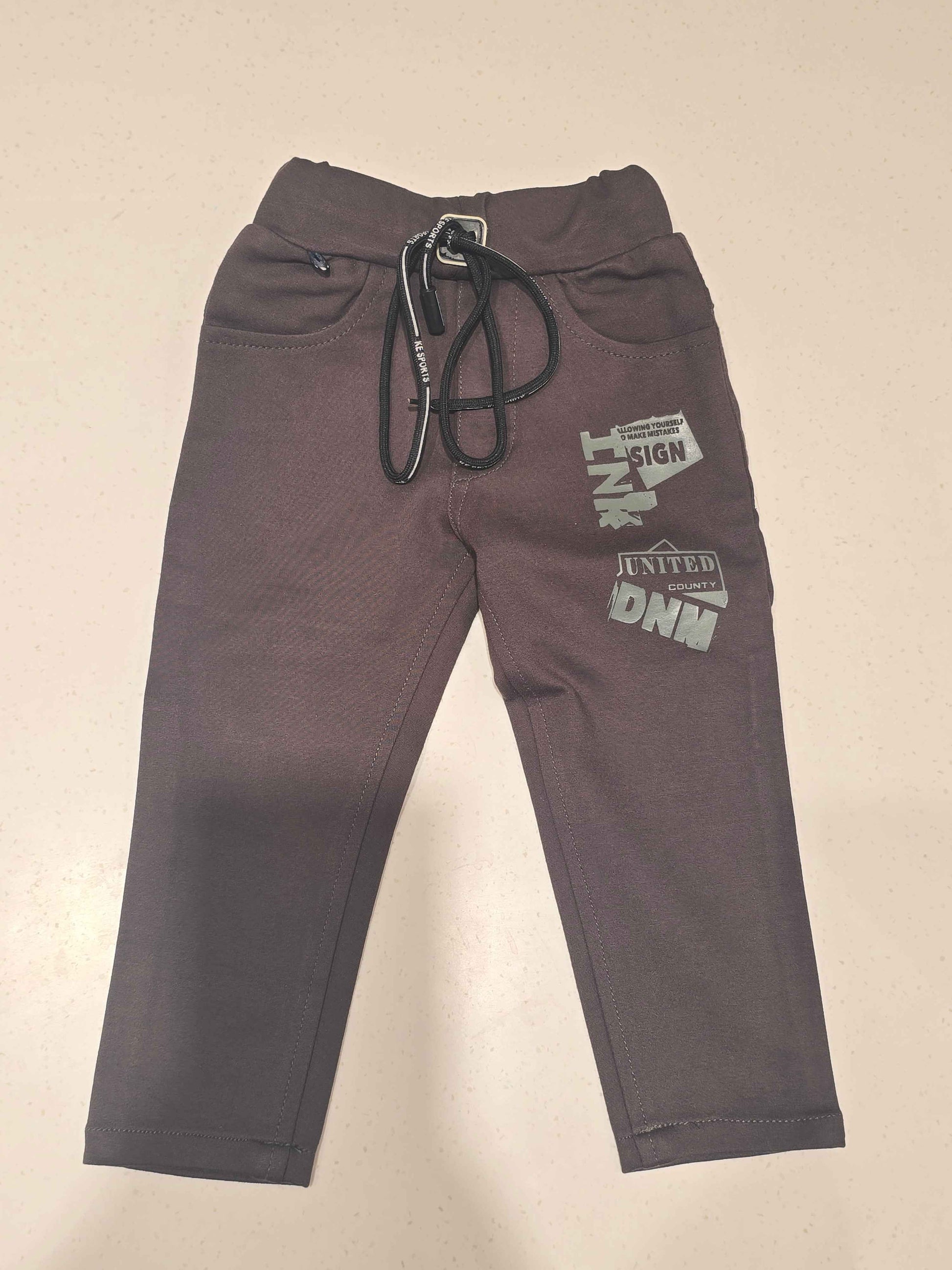 Stretchable material dark brwon colour pant for boy with round Elasticable