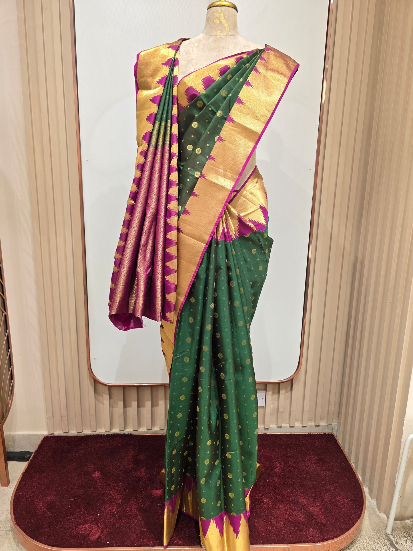 Pure handloom Kanjivaram silk saree with temple border and traditional motifs