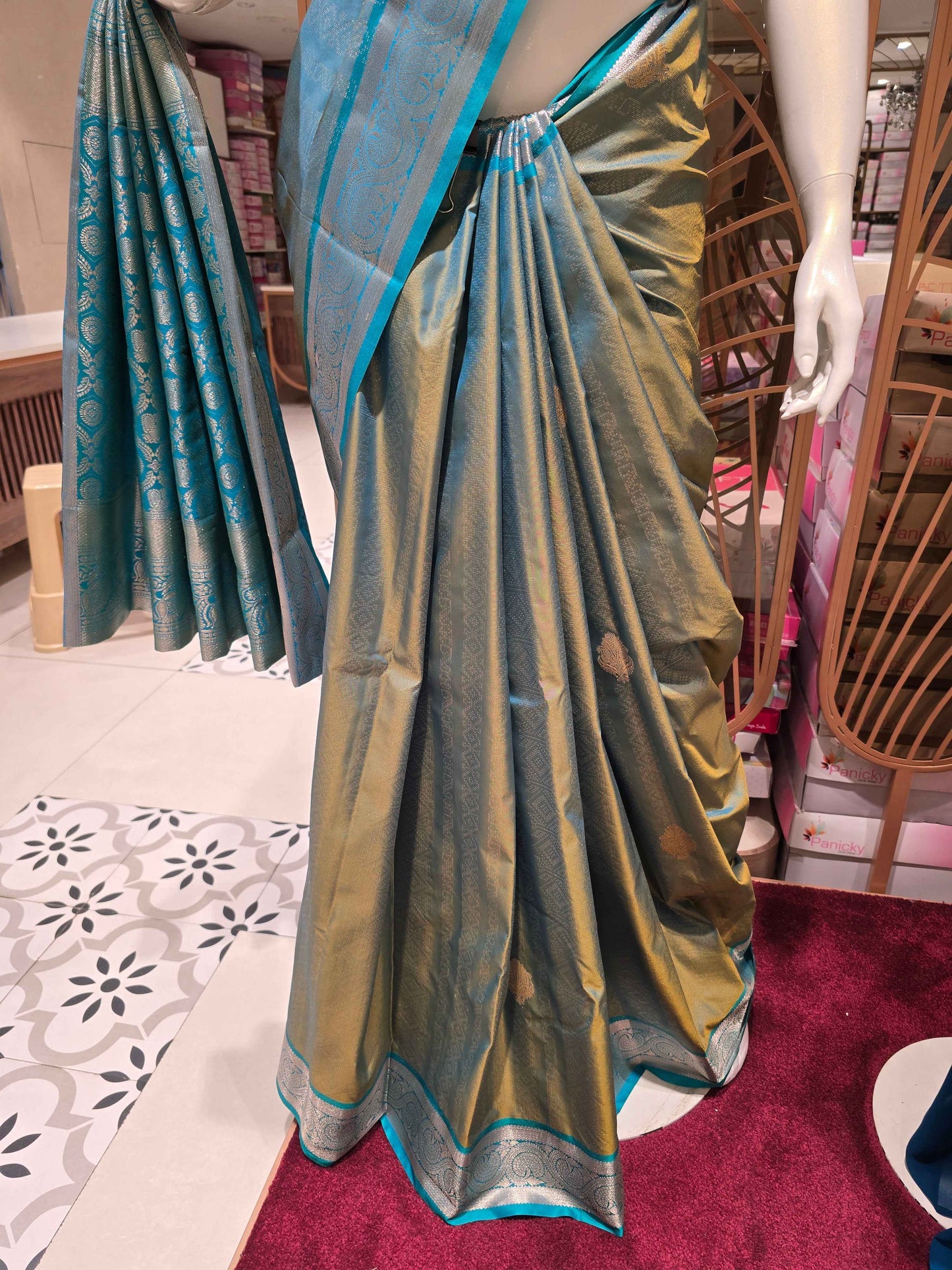 Semi tissue Kanjivaram saree with rich pallu and contrast blouse