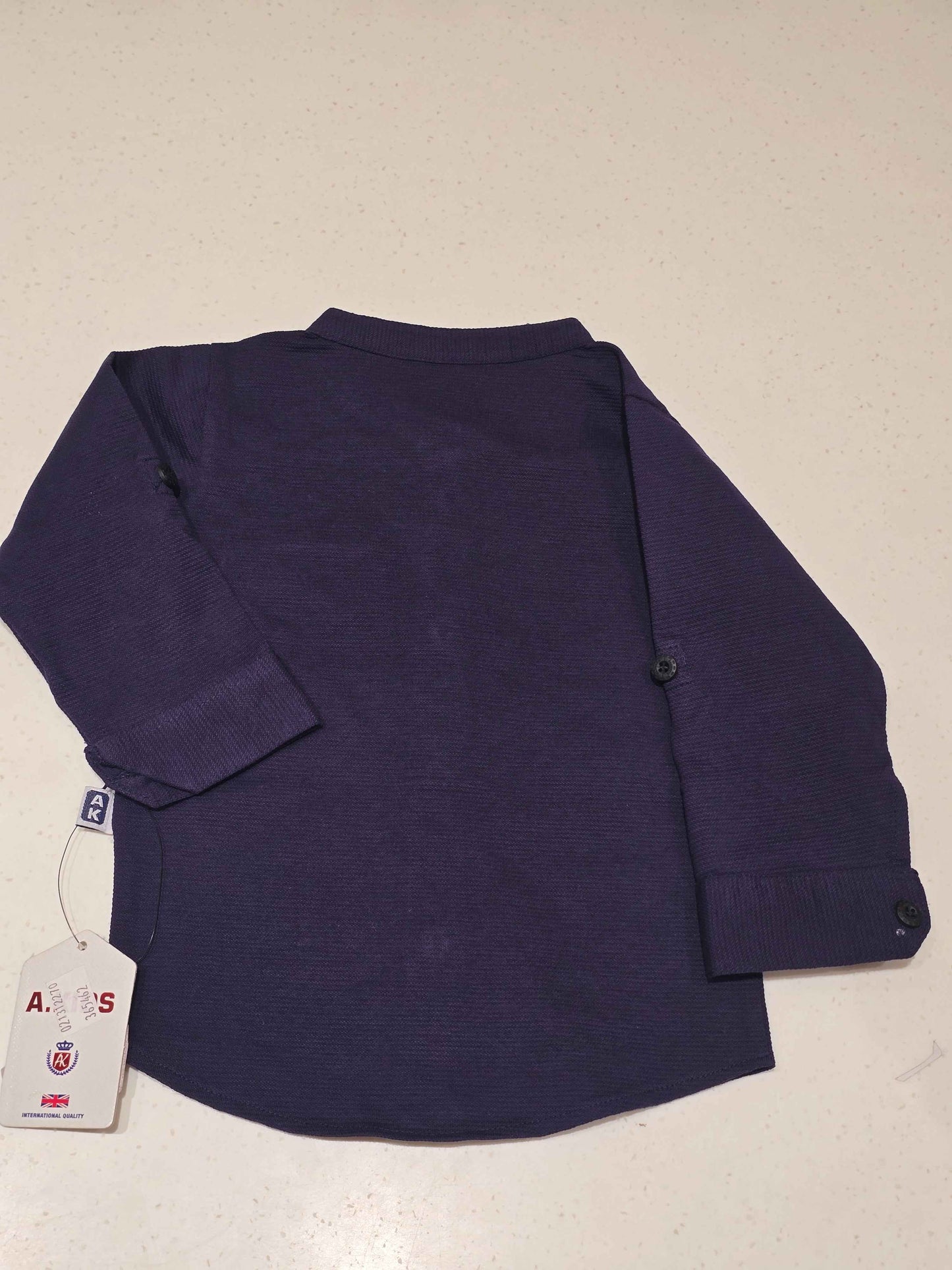 Cotton. Material dark blue colour shirt