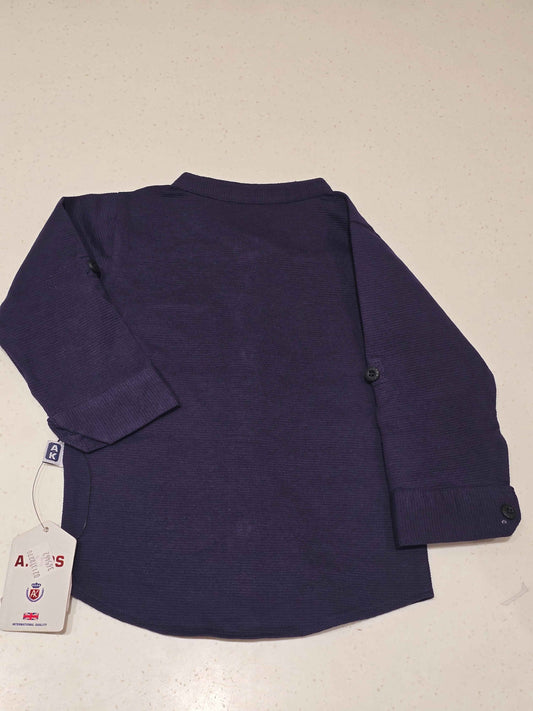 Cotton. Material dark blue colour shirt