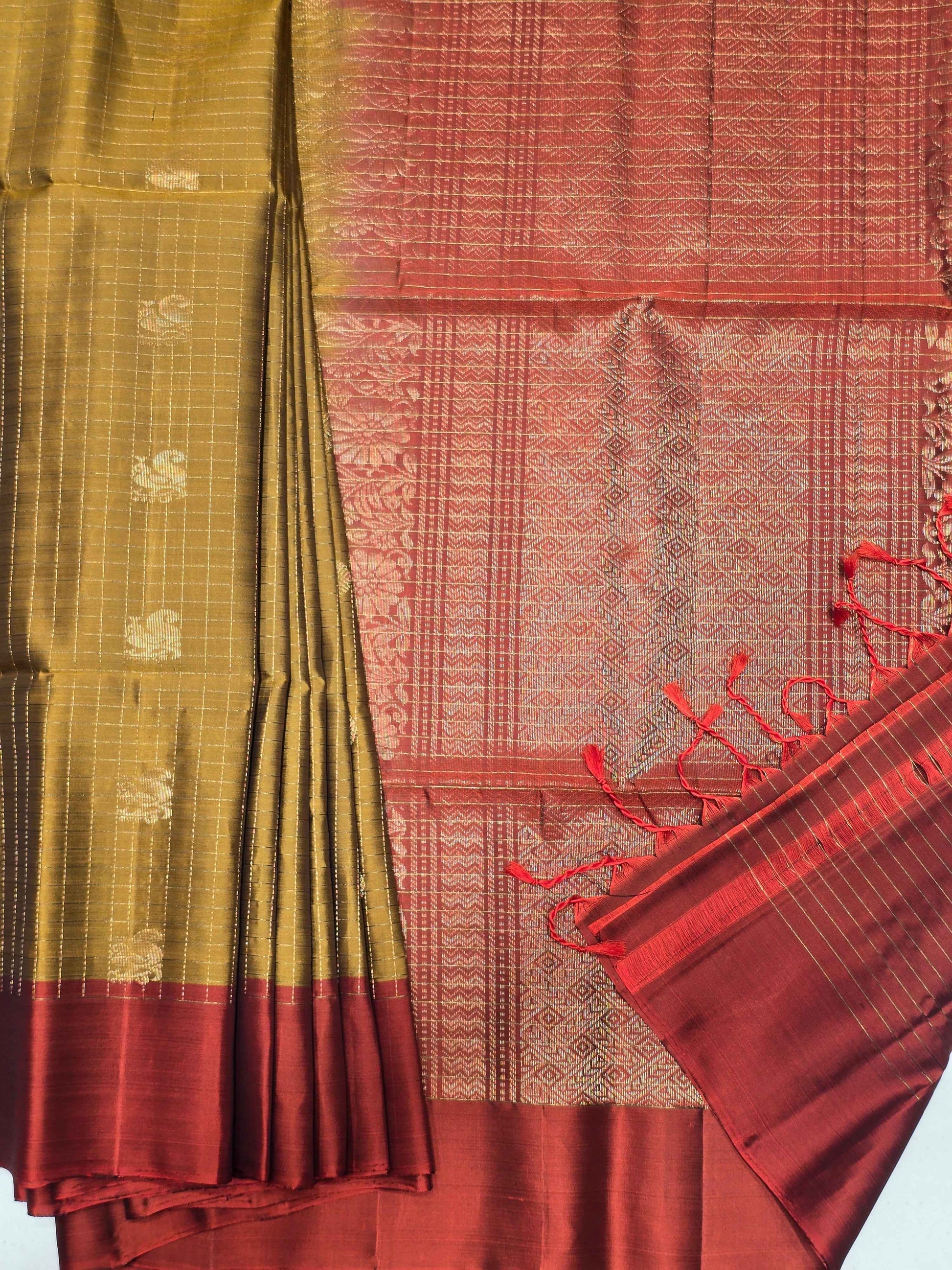 Pure softsilk saree , checked pattren with traditional peacock design motifs