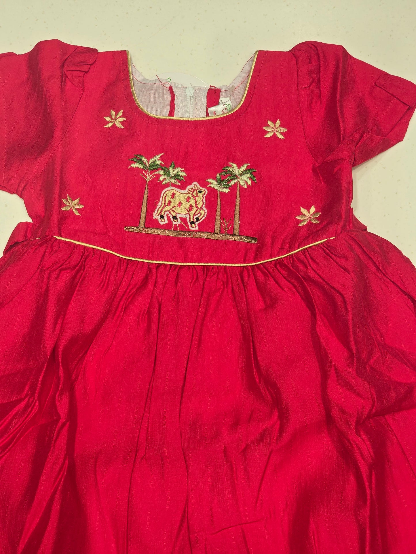 Cotton material cherry pink color baby-frock with thread embroidery