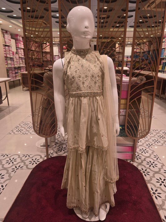 Cream Colored Tissue Silk Sharara Palazzo Set for Girls with Mirror & Stone Work, Zari Embroidery I-Neck and Side-Cut Net Dupatta – 3 Piece Ethnic Set