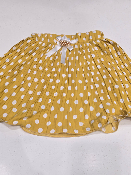 mustard yellow and white polka dot pleated skirt