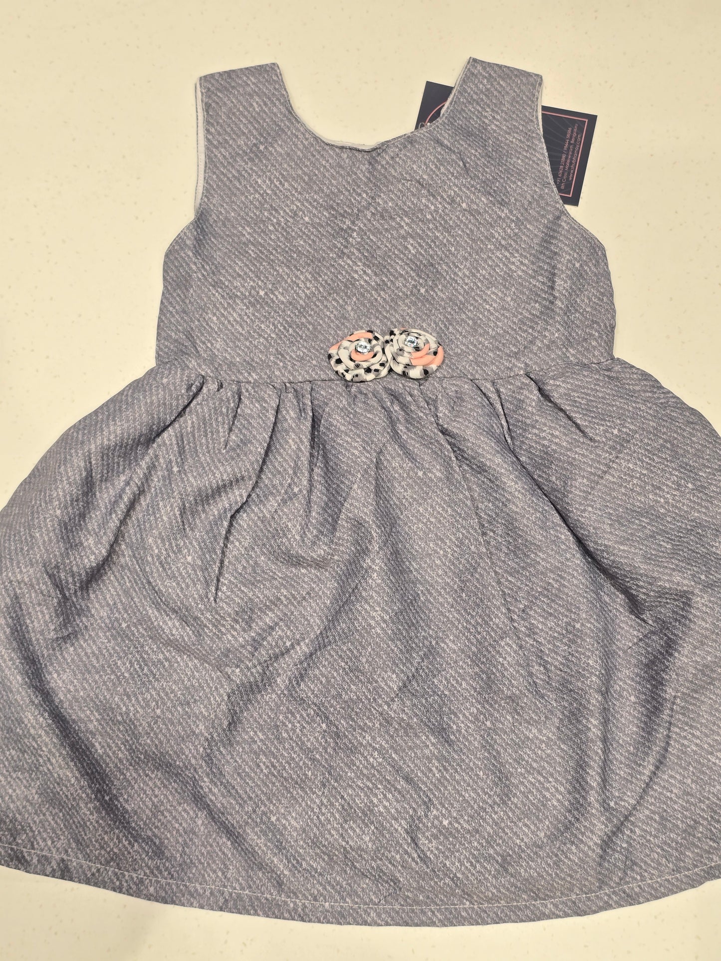 Cotton material gray color baby frock with round neck