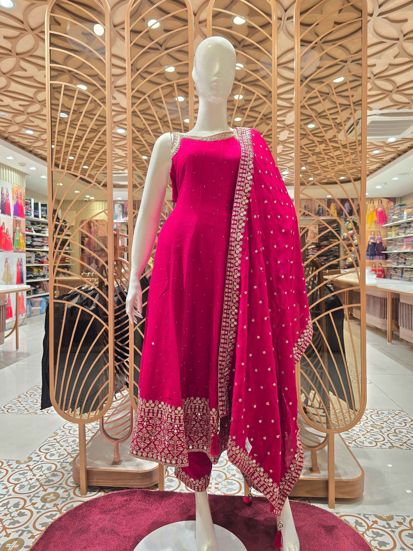 Semi silk material Rani pink colour anarkali set with speghetti neck