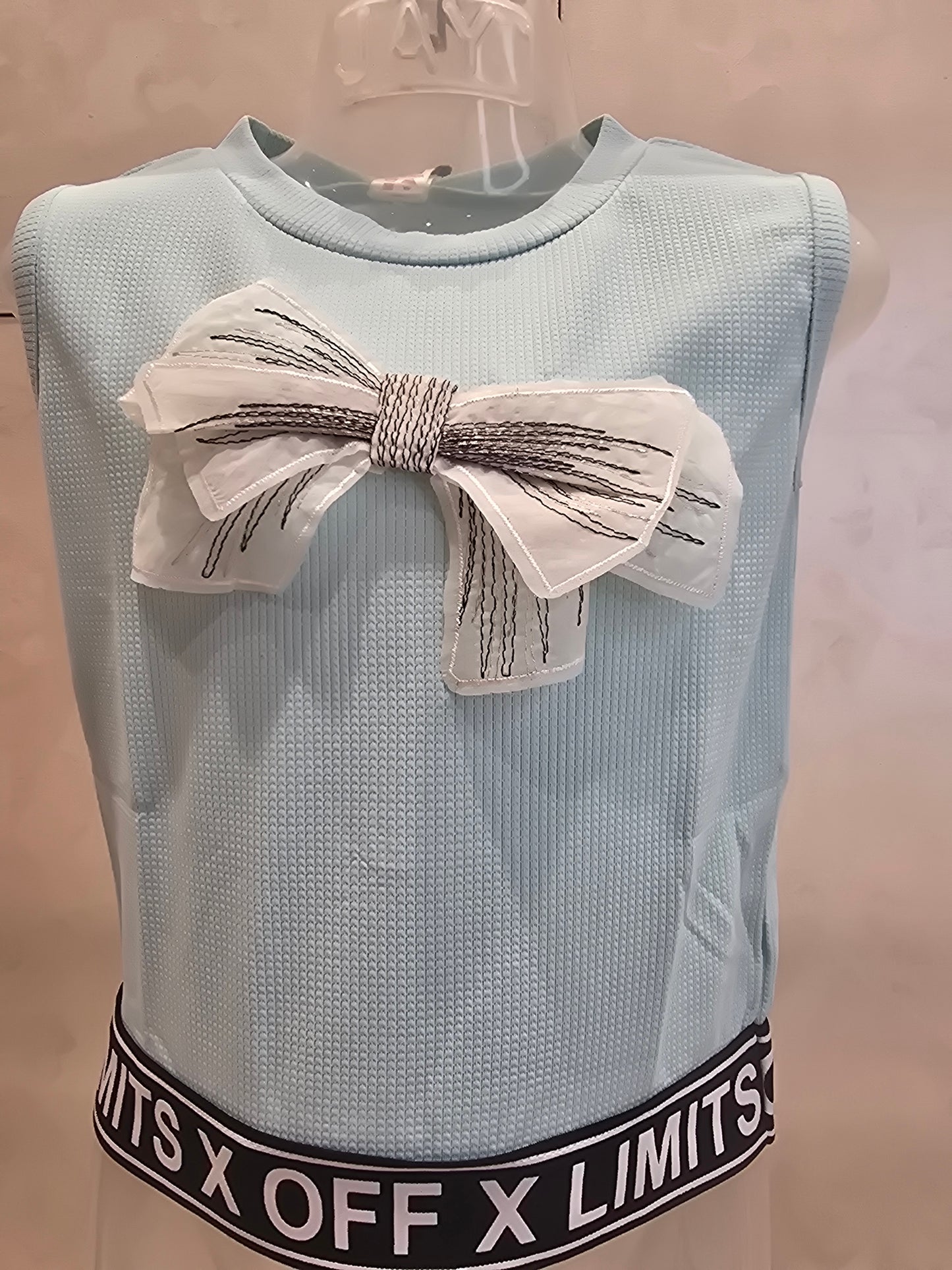 Sky Blue Hosiery Western Top for Girls with Stylish Bow Detail – Sleeveless Party Wear