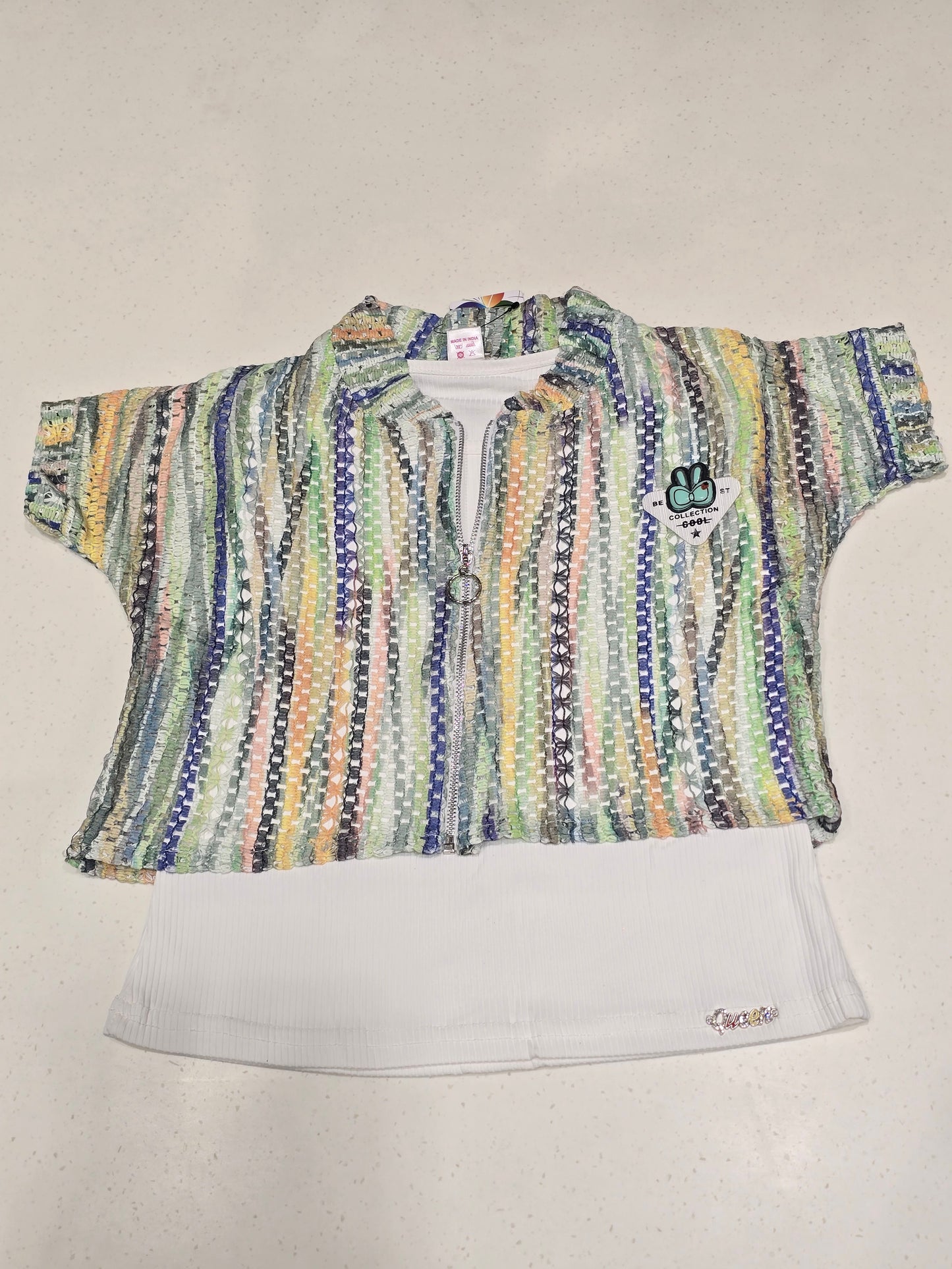 girls' two-piece knit clothing set featuring a multi-colored striped mesh zip-up crop shirt layered over a solid white tank top.