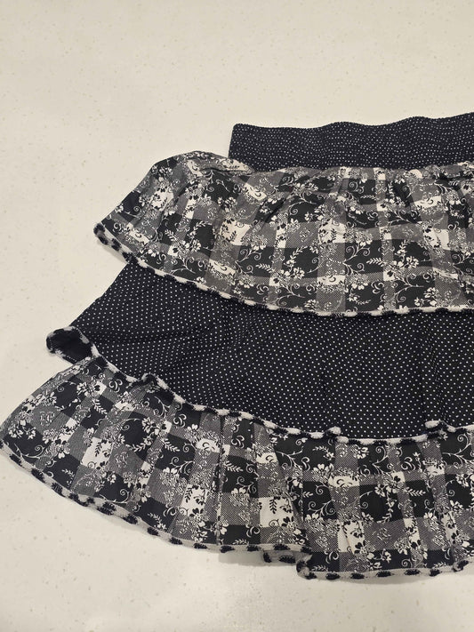 black and white mixed-pattern tiered ruffle mini skirt
