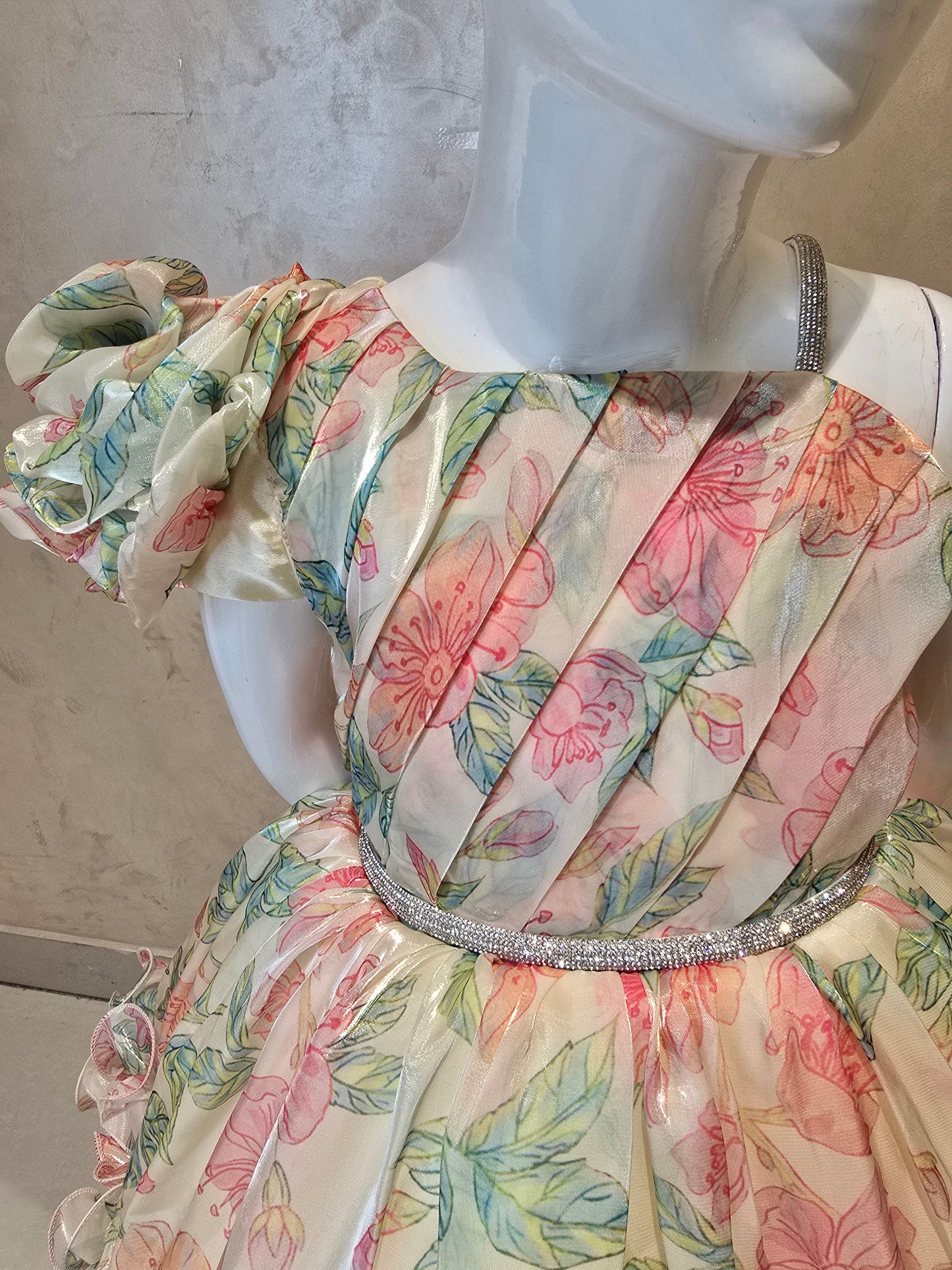 Girls Printed Tissue Satin Party Wear Short Frock with Floral Prints, Pleated Bottom, Asymmetric Sleeve Design and Waist Belt for Special Occasions